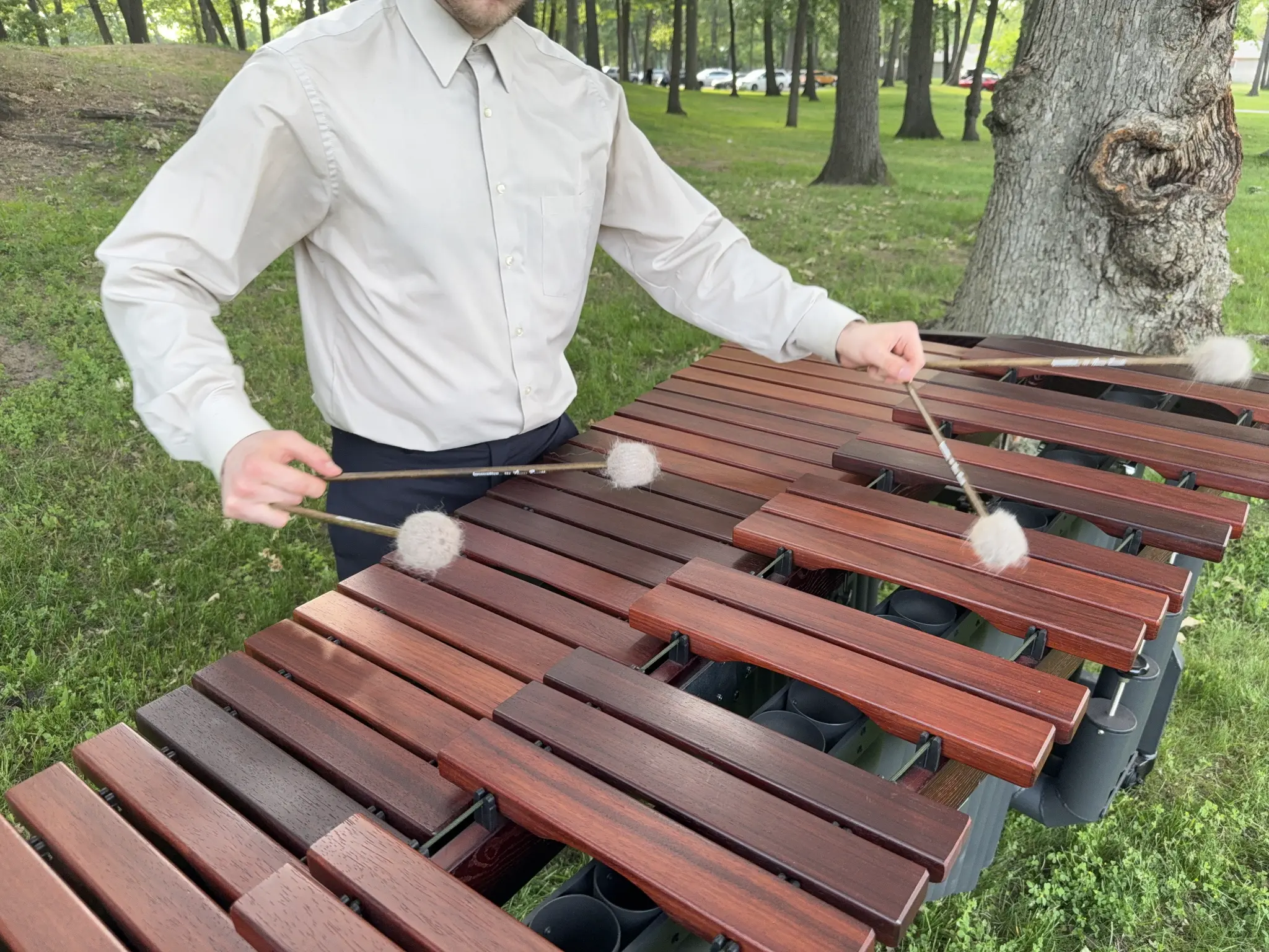 Spencer Perilloux performing on marimba outdoors